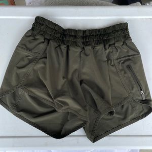 Olive green Lululemon running shorts